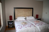 Double bed in Cottage Pinotage