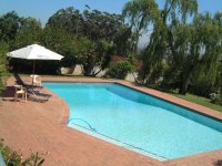 View on swimming pool from guestroom 'Shiraz en-suite'